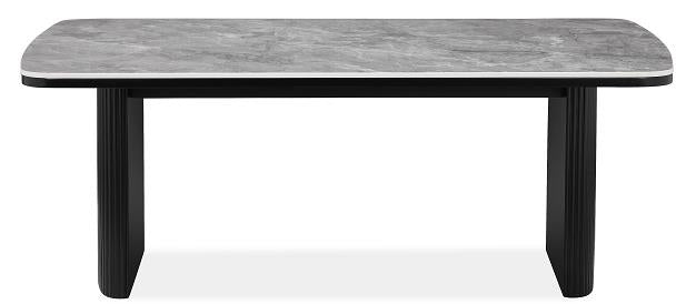 Raiden coffee table with grey ceramic top and ribbed black legs